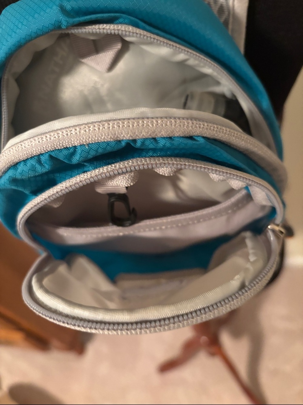 Nathan Women’s Teal and White Hydration Backpack - Picture 5 of 5